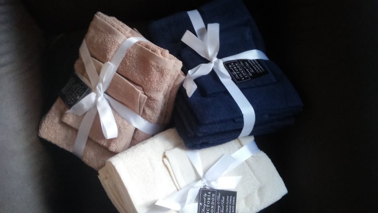 pleasantly folded and tied up towels